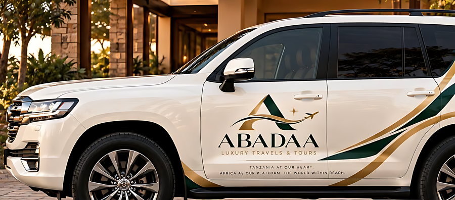 The ABADAA Land Cruiser in green and gold livery, seen side-on